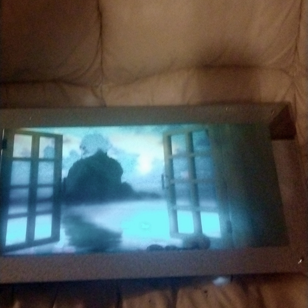 Vintage moving picture with sound and lights 16x 13 x 3  good condition like new